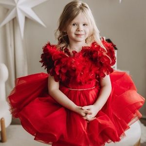 Beautiful red puffball dress with feathers